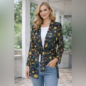 NWT Sheer floral top.  Ties in the front Size L Navy background.